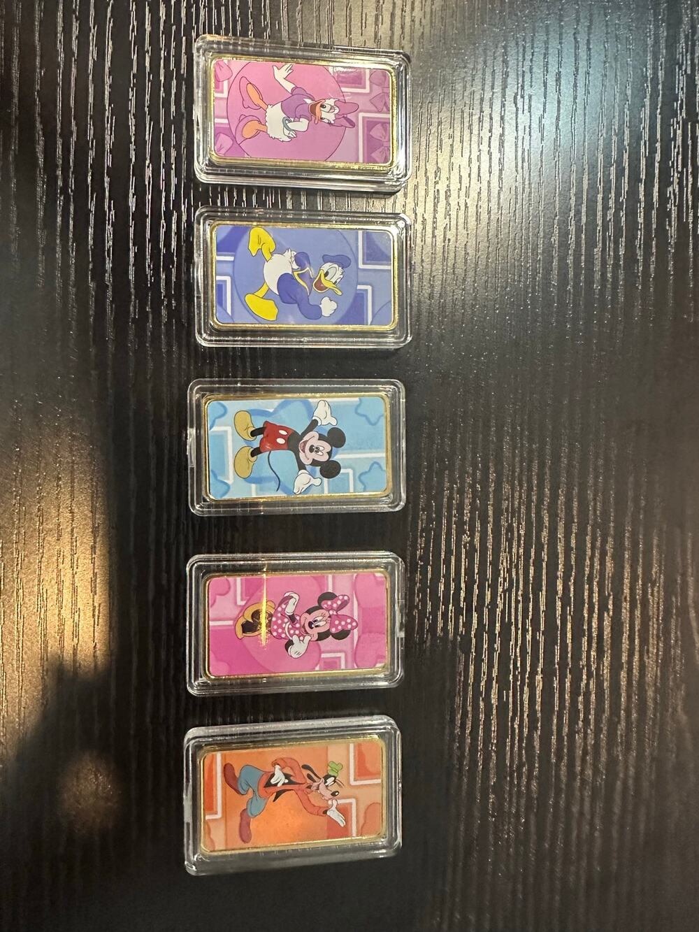 Bring classic character charm to your collection with this colorful 5-piece set